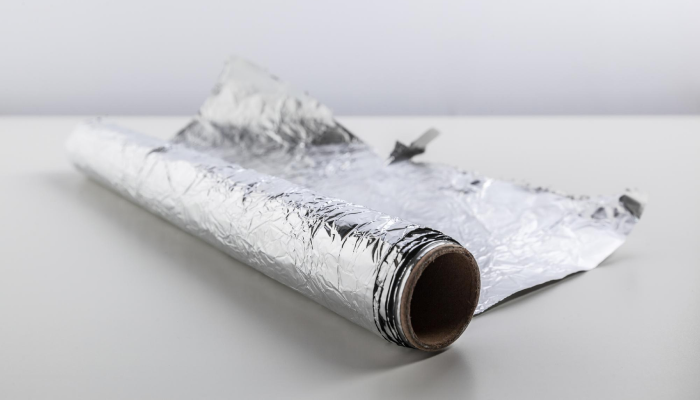 Perbedaan Aluminium Foil & Metalized Sebagai Peredam Atap